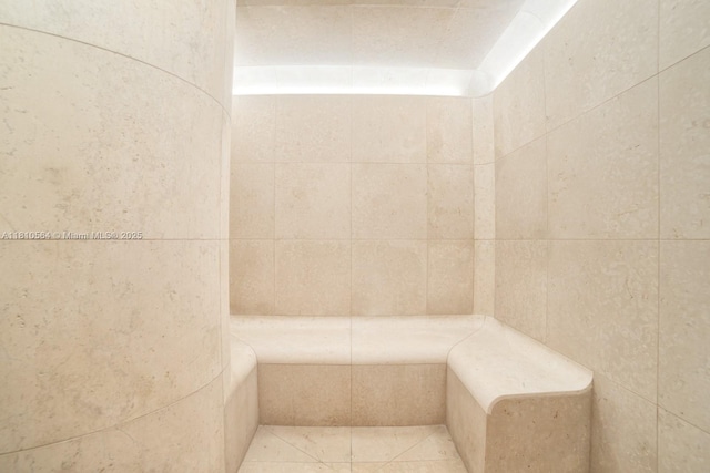 8701 Collins Ave Unit 905, Miami Beach, FL 33154 - full bathroom featuring tile walls