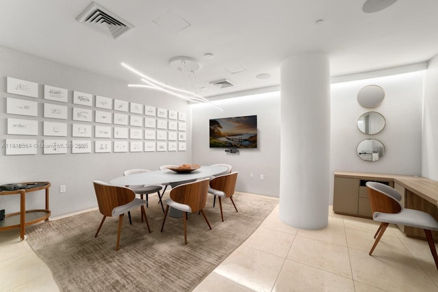 8701 Collins Ave Unit 905, Miami Beach, FL 33154 - dining space featuring light tile patterned flooring and a desk