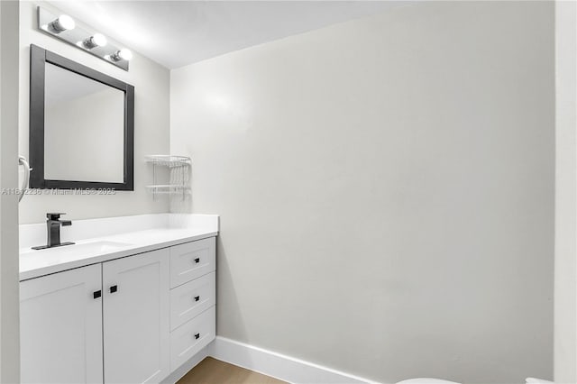 6934 SW 114th Pl Unit A55, Miami, FL 33173 - half bath with vanity, baseboards, and toilet