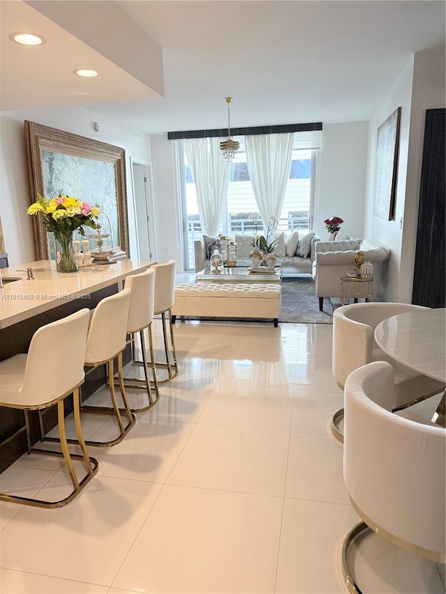 7661 NW 107th Ave Unit 303, Doral, FL 33178 - dining room featuring recessed lighting and light tile patterned flooring