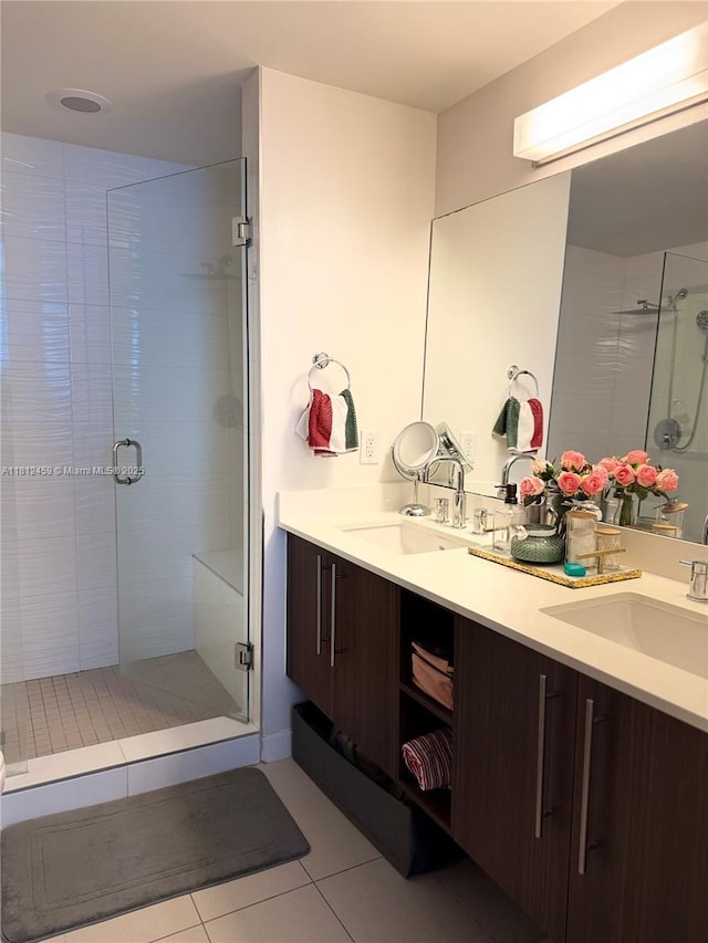 7661 NW 107th Ave Unit 303, Doral, FL 33178 - full bath with double vanity, a shower stall, and tile patterned floors