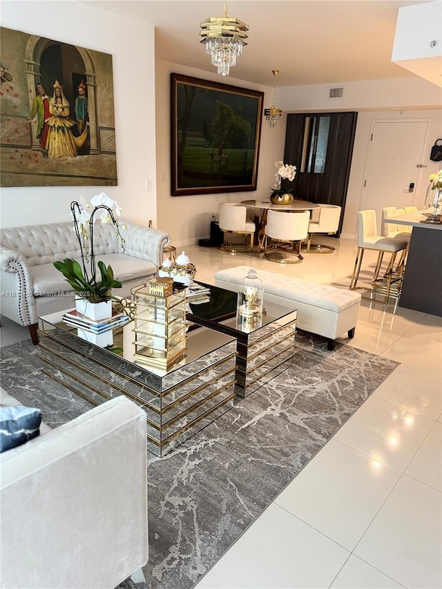 7661 NW 107th Ave Unit 303, Doral, FL 33178 - living room with a chandelier and tile patterned floors
