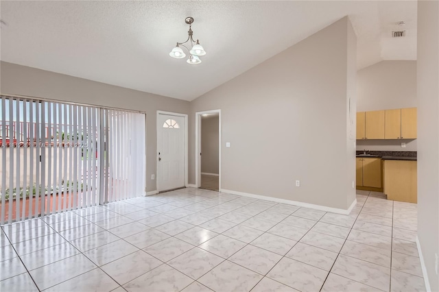 20316 NW 32nd Path, Miami Gardens, FL 33056 - unfurnished room with a chandelier, baseboards, light tile patterned flooring, high vaulted ceiling, and a sink
