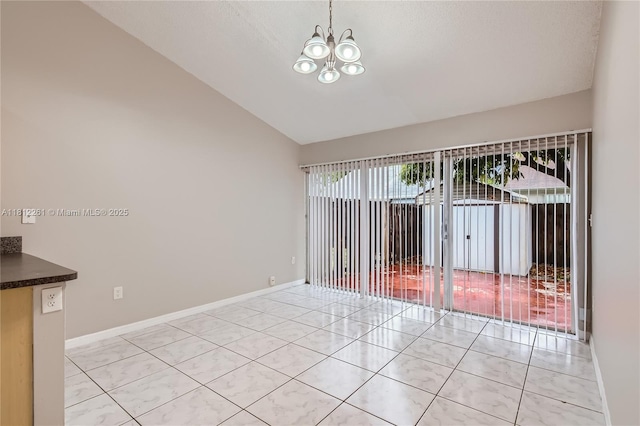 20316 NW 32nd Path, Miami Gardens, FL 33056 - spare room featuring a chandelier, baseboards, light tile patterned flooring, and high vaulted ceiling