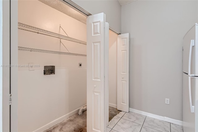20316 NW 32nd Path, Miami Gardens, FL 33056 - washroom featuring electric dryer hookup, washer hookup, baseboards, and arched walkways