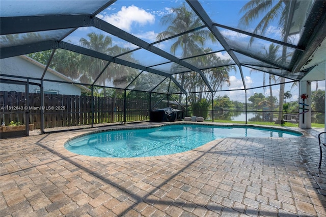 2750 SW 86th Way, Davie, FL 33328 - view of swimming pool featuring a patio area and glass enclosure