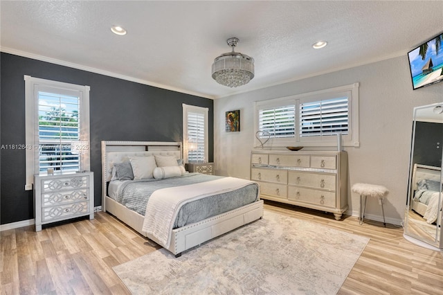 2750 SW 86th Way, Davie, FL 33328 - bedroom featuring crown molding, multiple windows, wood finished floors, a textured ceiling, and baseboards
