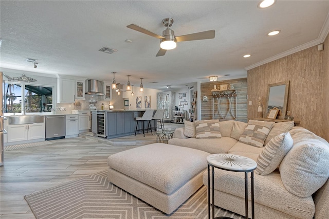 2750 SW 86th Way, Davie, FL 33328 - living room featuring ceiling fan, wine cooler, recessed lighting, and ornamental molding