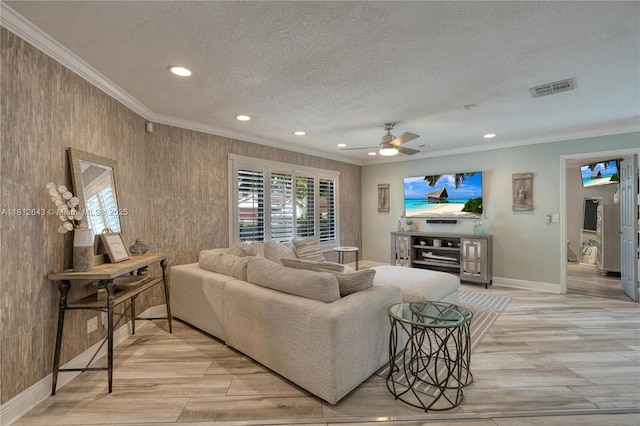 2750 SW 86th Way, Davie, FL 33328 - living room with crown molding, a ceiling fan, recessed lighting, baseboards, and a textured ceiling