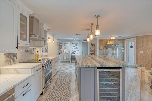 2750 SW 86th Way, Davie, FL 33328 - kitchen with wine cooler, wall chimney exhaust hood, double oven range, and light wood-type flooring