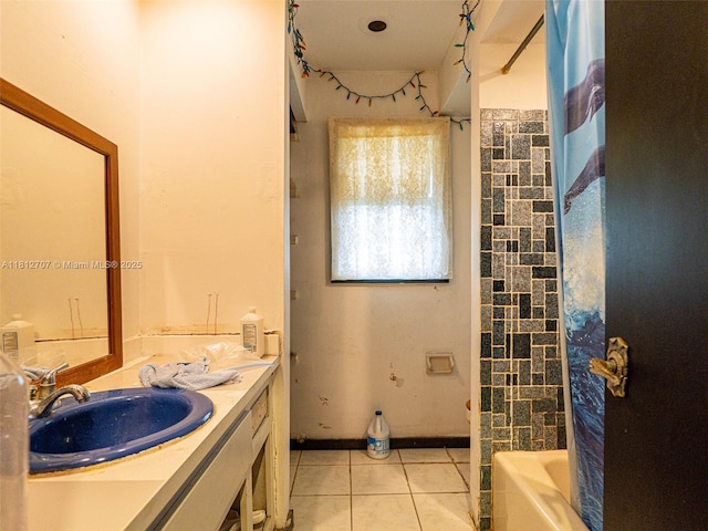 802 SE Kendall Ave, Port St Lucie, FL 34983 - bathroom featuring vanity, tile patterned flooring, and shower / tub combo with curtain