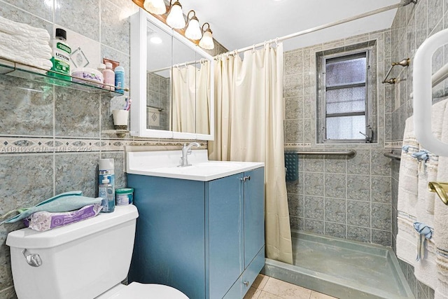 911 E 9th Pl, Hialeah, FL 33010 - full bathroom featuring toilet, tile walls, vanity, tiled shower, and tile patterned floors