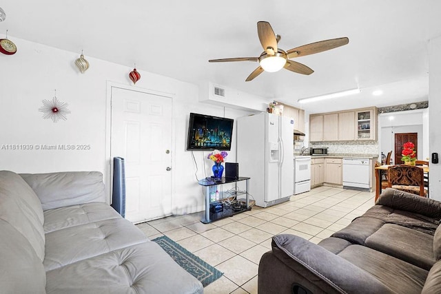 911 E 9th Pl, Hialeah, FL 33010 - living room with light tile patterned flooring, a ceiling fan, and recessed lighting