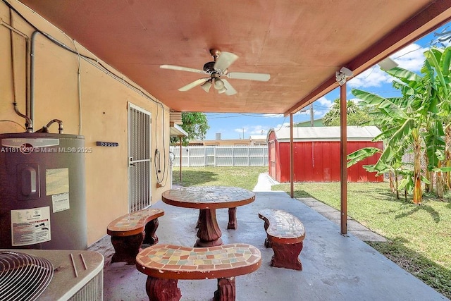 911 E 9th Pl, Hialeah, FL 33010 - view of patio with electric water heater and a ceiling fan