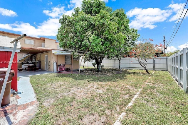 911 E 9th Pl, Hialeah, FL 33010 - view of yard with a patio
