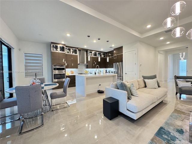 5444 SW Saint Armands Way, Westlake, FL 33470 - living room featuring recessed lighting