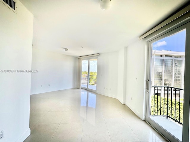 2701 SW 3rd Ave Unit 503, Miami, FL 33129 - unfurnished room featuring light tile patterned flooring and baseboards