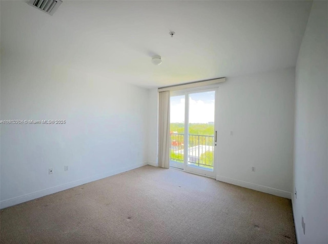 2701 SW 3rd Ave Unit 503, Miami, FL 33129 - empty room with light colored carpet, baseboards, and fire sprinkler in ceiling
