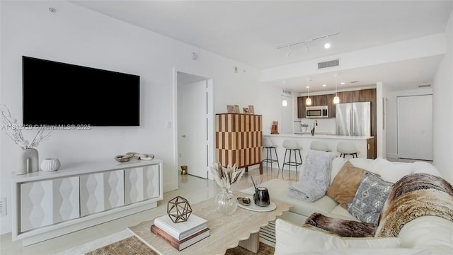 488 NE 18th St Unit 4208, Miami, FL 33132 - living area featuring rail lighting and light tile patterned floors