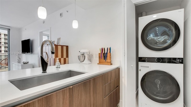 488 NE 18th St Unit 4208, Miami, FL 33132 - laundry room with stacked washer / dryer