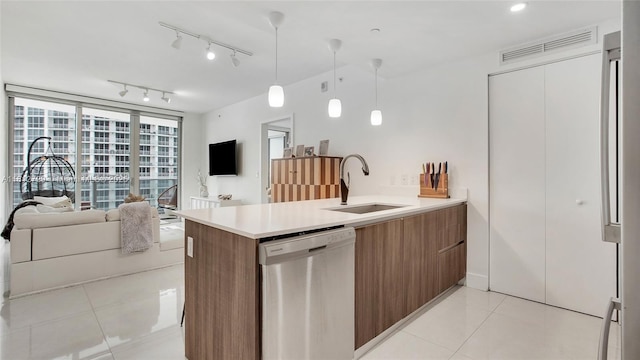 488 NE 18th St Unit 4208, Miami, FL 33132 - kitchen featuring stainless steel dishwasher, a sink, modern cabinets, light tile patterned floors, and open floor plan