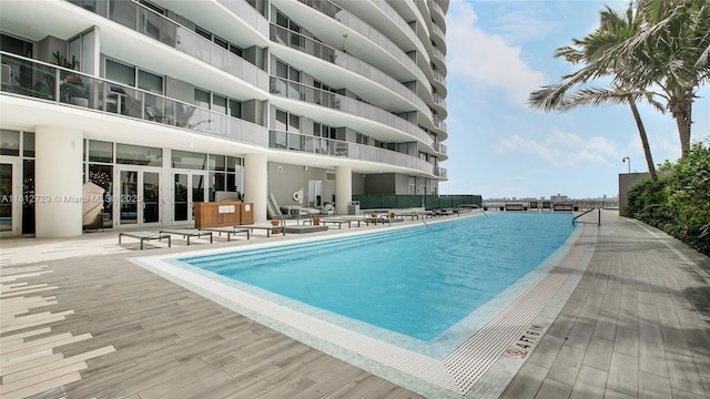 488 NE 18th St Unit 4208, Miami, FL 33132 - community pool with french doors and a patio