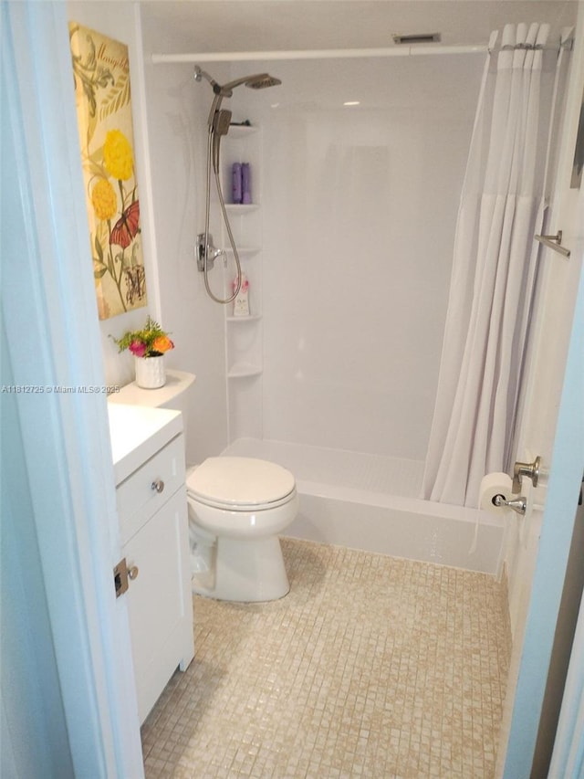 3300 N Palm Aire Dr Unit 706, Pompano Beach, FL 33069 - full bathroom with a shower with curtain, toilet, vanity, and tile patterned flooring