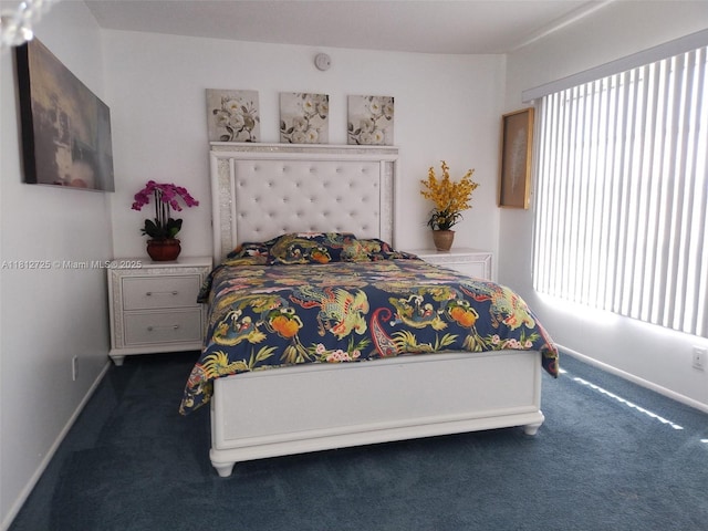 3300 N Palm Aire Dr Unit 706, Pompano Beach, FL 33069 - bedroom with dark carpet and baseboards