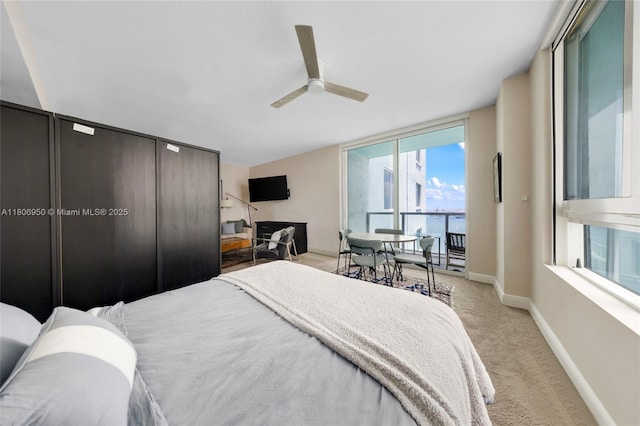 1900 N Bayshore Dr Unit 3605, Miami, FL 33132 - bedroom featuring light colored carpet, ceiling fan, and a closet