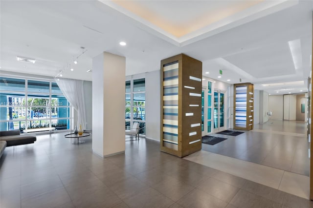 1900 N Bayshore Dr Unit 3605, Miami, FL 33132 - community lobby with a wall of windows and recessed lighting