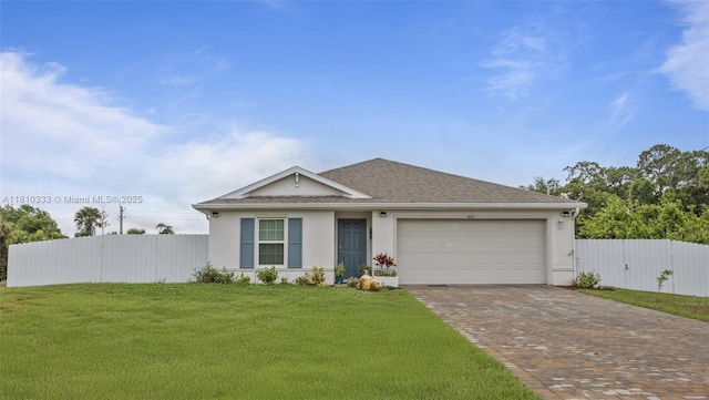 3021 June Cir Fl, LaBelle, FL 33935 - ranch-style home featuring decorative driveway, an attached garage, stucco siding, and roof with shingles