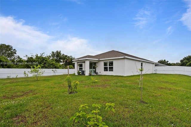 3021 June Cir Fl, LaBelle, FL 33935 - back of property featuring stucco siding