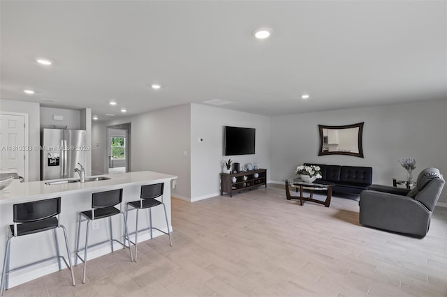 3021 June Cir Fl, LaBelle, FL 33935 - living area featuring recessed lighting, light wood-type flooring, and baseboards