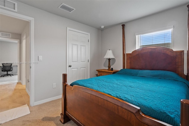 3021 June Cir Fl, LaBelle, FL 33935 - bedroom featuring light carpet and baseboards