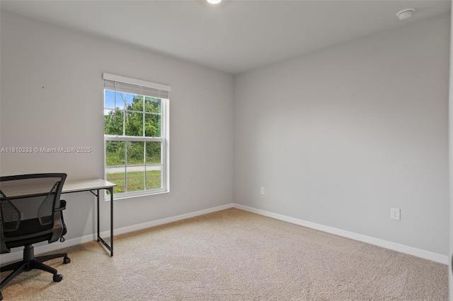 3021 June Cir Fl, LaBelle, FL 33935 - unfurnished office with carpet flooring and baseboards