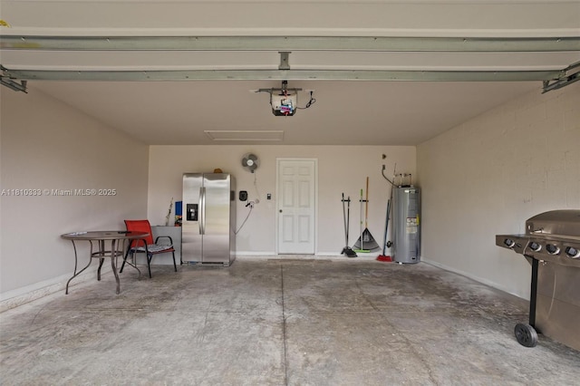 3021 June Cir Fl, LaBelle, FL 33935 - garage with stainless steel fridge, water heater, a garage door opener, and baseboards