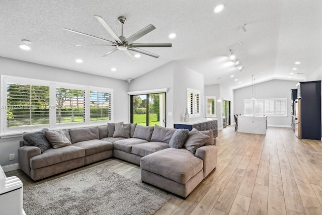 20141 NW 8th St, Pembroke Pines, FL 33029 - living area with lofted ceiling, ceiling fan, light wood-style floors, a textured ceiling, and recessed lighting