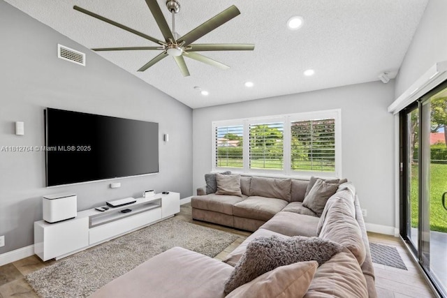 20141 NW 8th St, Pembroke Pines, FL 33029 - living area with a textured ceiling, healthy amount of natural light, recessed lighting, a ceiling fan, and wood finished floors