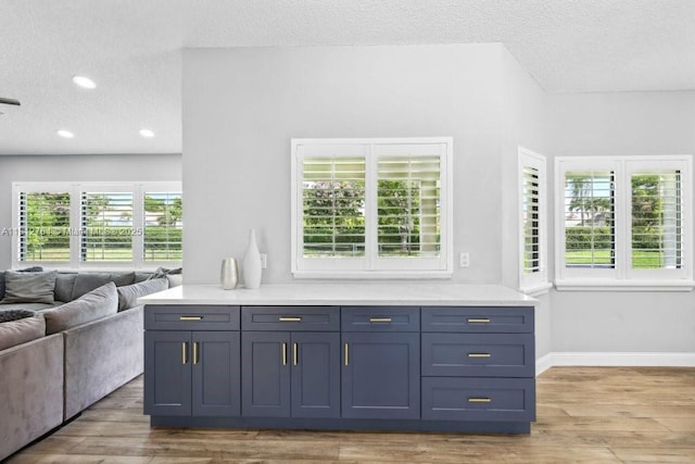 20141 NW 8th St, Pembroke Pines, FL 33029 - bar with a textured ceiling, wood finished floors, and baseboards