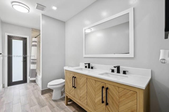 20141 NW 8th St, Pembroke Pines, FL 33029 - full bath with toilet, double vanity, curtained shower, and wood finished floors