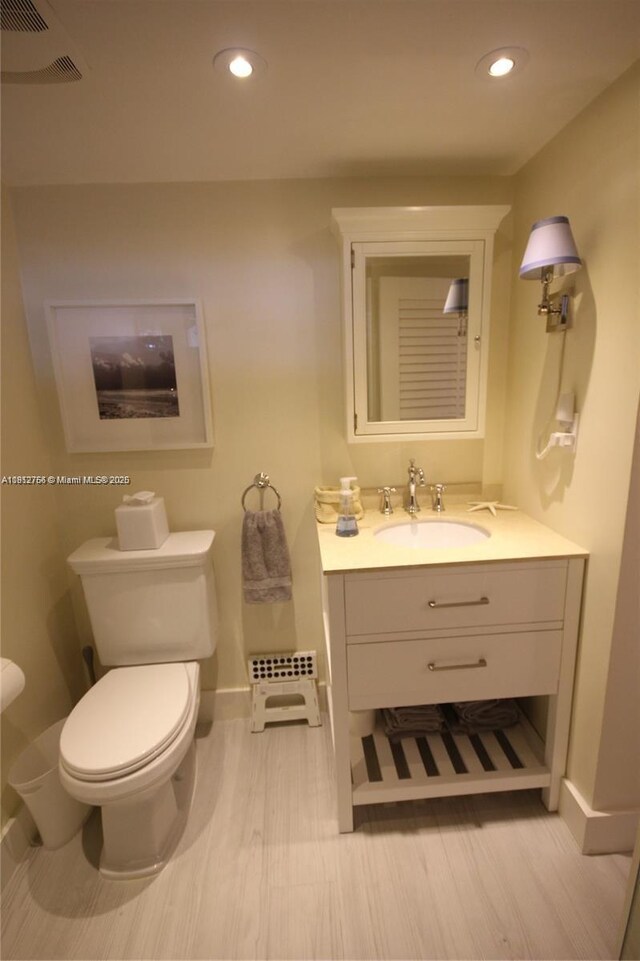 5161 Collins Ave Unit 315, Miami Beach, FL 33140 - bathroom featuring vanity, recessed lighting, and wood finished floors