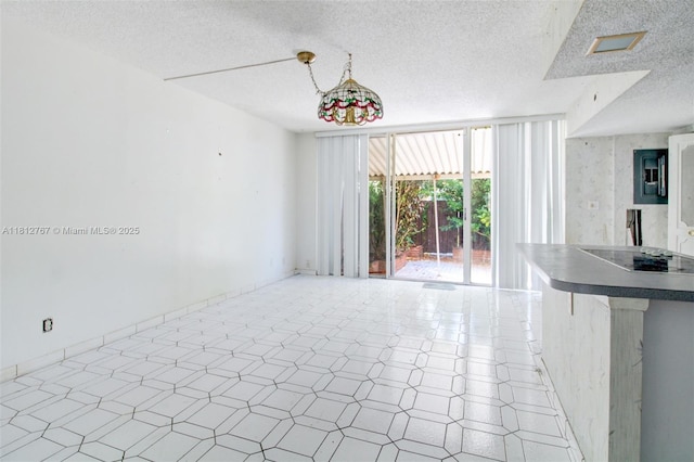 1006 NE 24th Ave Unit 190, Hallandale Beach, FL 33009 - unfurnished dining area featuring a textured ceiling