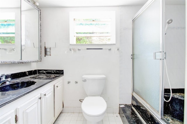 1006 NE 24th Ave Unit 190, Hallandale Beach, FL 33009 - bathroom featuring vanity, a stall shower, toilet, and plenty of natural light
