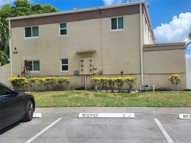 1061 NW 80th Ave Unit J, Margate, FL 33063 - view of property with uncovered parking