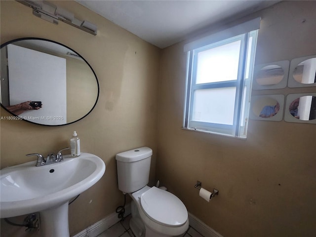 1061 NW 80th Ave Unit J, Margate, FL 33063 - bathroom with toilet and baseboards