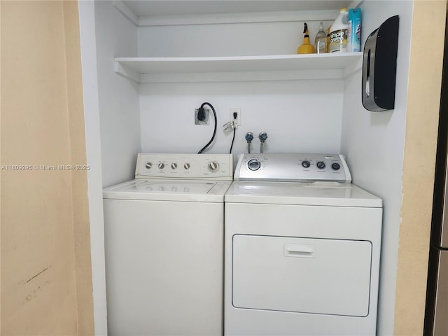1061 NW 80th Ave Unit J, Margate, FL 33063 - laundry area with washing machine and clothes dryer