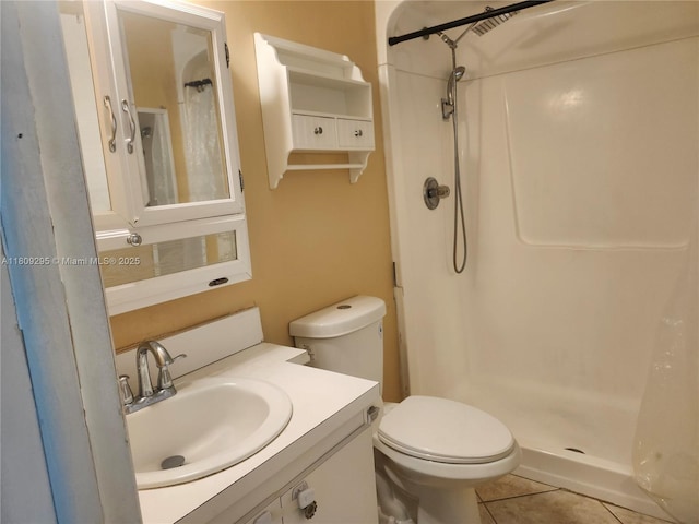 1061 NW 80th Ave Unit J, Margate, FL 33063 - bathroom featuring a stall shower, tile patterned floors, and vanity