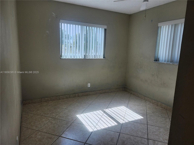 1061 NW 80th Ave Unit J, Margate, FL 33063 - spare room with ceiling fan and tile patterned flooring