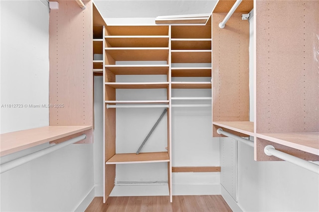 18801 NW 29th Ct, Miami Gardens, FL 33056 - walk in closet with wood finished floors