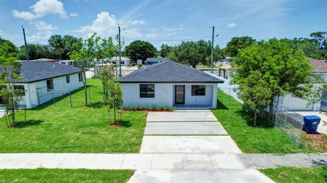 2411 NW 153rd St, Miami Gardens, FL 33054 - view of front facade featuring a shingled roof, stucco siding, and driveway